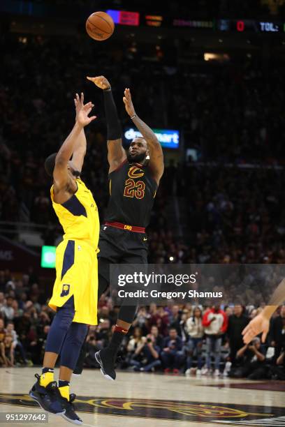 LeBron James of the Cleveland Cavaliers hits the game winning shot over Thaddeus Young of the Indiana Pacers to win Game Five of the Eastern...