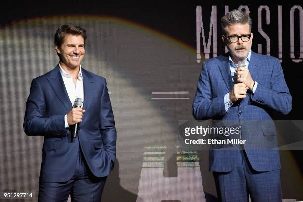 Actor Tom Cruise and director/writer/producer Christopher McQuarrie speak onstage during the CinemaCon 2018 Paramount Pictures Presentation...