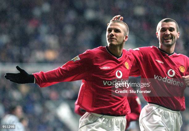 David Beckham and Roy Keane of Manchester United celebrate during the FA Carling Premiership match against Newcastle United played at St James Park,...