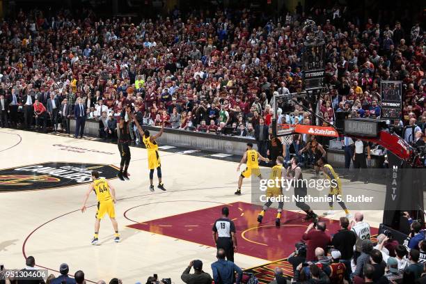 LeBron James of the Cleveland Cavaliers shoots the ball to win the game against the Indiana Pacers in Game Five of Round One of the 2018 NBA Playoffs...