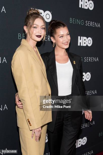 Gigi Hadid and Bella Hadid attend the "Being Serena" New York Premiere at Time Warner Center on April 25, 2018 in New York City.