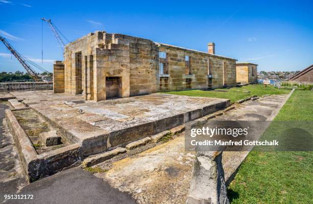 convict built sandstone buildings cockatoo island shipyard heritage site, sydney harbour - カカトゥー島 ストックフォトと画像