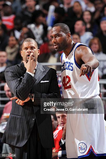 Head coach Eddie Jordan and Elton Brand of the Philadelphia 76ers talk on the sidelines during the game against the Cleveland Cavaliers at Wachovia...