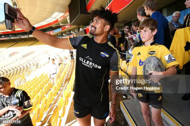 Ardie Savea interacts with fans during a Hurricanes Super Rugby Captain's Run at Westpac Stadium on April 26, 2018 in Wellington, New Zealand.