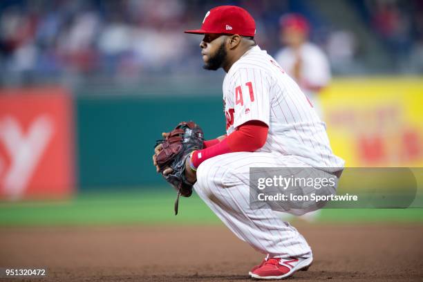 Philadelphia Phillies 1B Carlos Santana kneels between pitches in the ninth inning during the game between the Arizona Diamondbacks and Philadelphia...