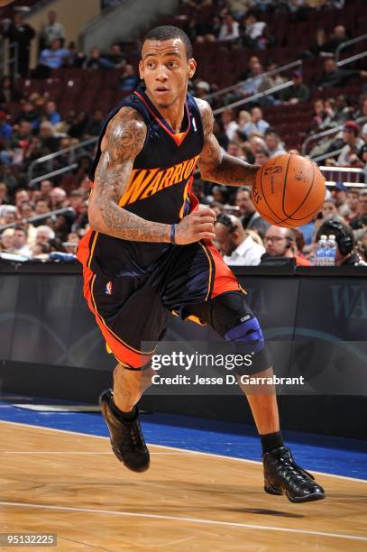 Monta Ellis of the Golden State Warriors moves the ball up court during the game against the Philadelphia 76ers at Wachovia Center on December 14,...