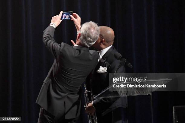 Claudio Del Vecchio and Wynton Marsalis take a selfie onstage during the Brooks Brothers Bicentennial Celebration at Jazz At Lincoln Center on April...