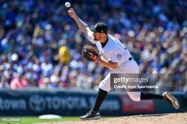 Colorado Rockies relief pitcher Bryan Shaw pitches during a regular season Major League Baseball game between the Chicago Cubs and the Colorado...