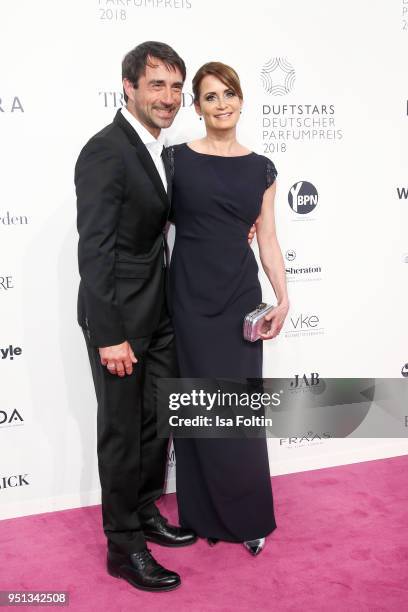 German actress Anja Kling and her partner Oliver Haas during the Duftstars at Flughafen Tempelhof on April 25, 2018 in Berlin, Germany.