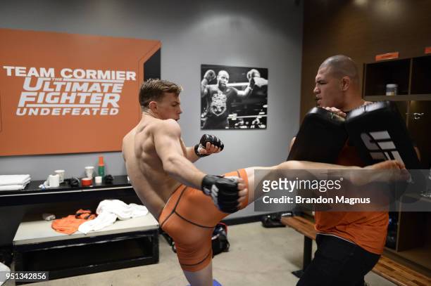 Brad Katona warms up backstage with Cain Velasquez during the filming of The Ultimate Fighter: Undefeated on February 9, 2017 in Las Vegas, Nevada.