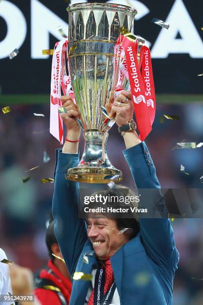 Matias Almeyda, Head Coach of Chivas celebrates with the champions trophy after the second leg match of the final between Chivas and Toronto FC as...