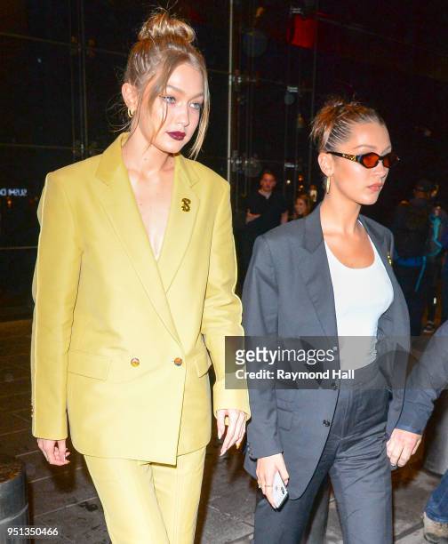 Model Gigi Hadid and Bella Hadid are seen walking in Midtown on April 25, 2018 in New York City.