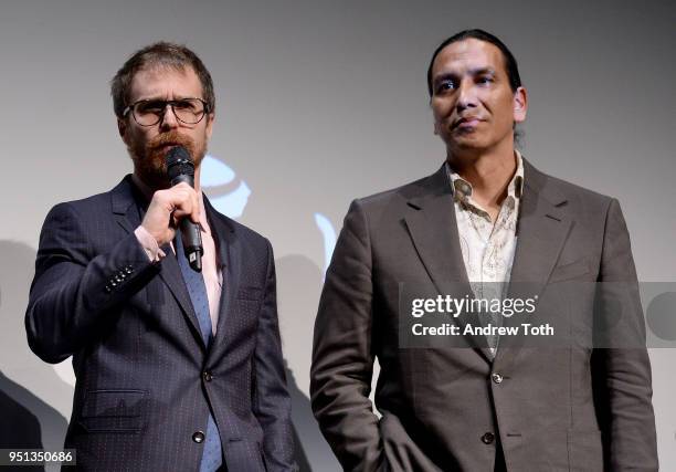 Sam Rockwell and Michael Greyeyes speak during an DIRECTTV Premiere Of "Women Walks Ahead" At 2018 Tribeca Film Festival on April 25, 2018 in New...