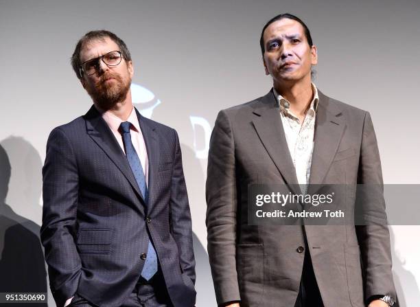 Sam Rockwell and Michael Greyeyes speak during an DIRECTTV Premiere Of "Women Walks Ahead" At 2018 Tribeca Film Festival on April 25, 2018 in New...