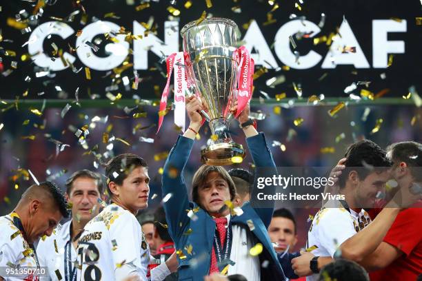 Matias Almeyda, Head Coach of Chivas celebrates with the champions trophy after the second leg match of the final between Chivas and Toronto FC as...