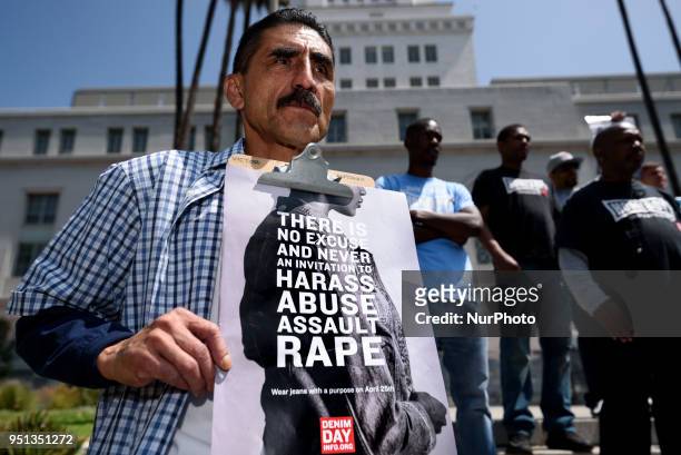 People participate in Denim Day to raise awareness about rape and sexual assault. Los Angeles, California on April 25, 2018.