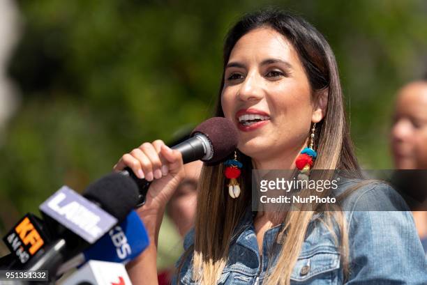 Maya Jupiter speaks at a press conference in honor of Denim Day and Sexual Assault Awareness Month in Los Angeles, California on April 25, 2018. The...