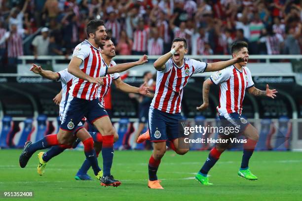 Players of Chivas celebrate their victory during the second leg match of the final between Chivas and Toronto FC as part of CONCACAF Champions League...