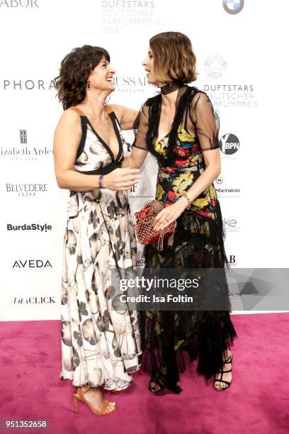 German presenter Marlene Lufen and model Eva Padberg during the Duftstars at Flughafen Tempelhof on April 25, 2018 in Berlin, Germany.