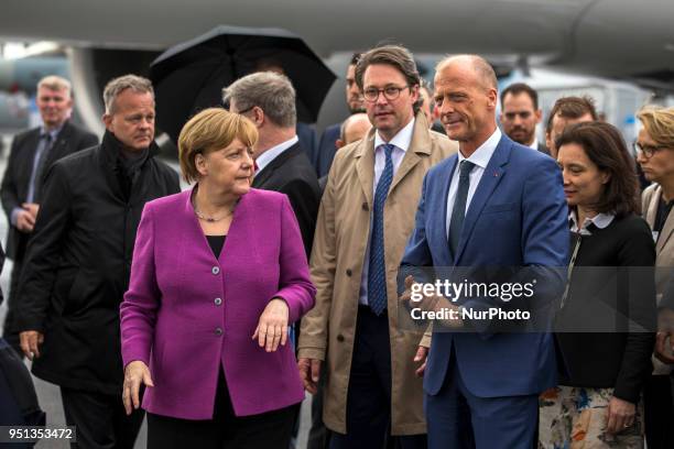 German Chancellor Angela Merkel , Transportation Minister Andreas Scheuer and Airbus CEO Thomas Enders visit the AIRBUS Stand during the Innovation...