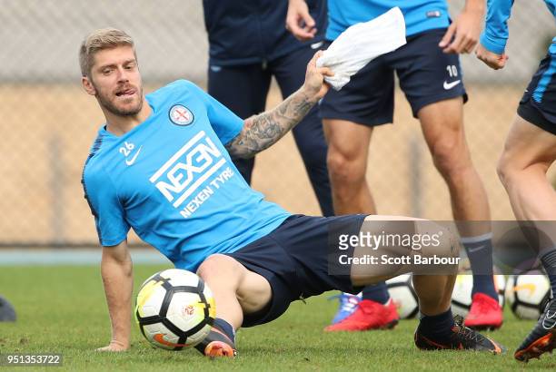 Luke Brattan of City FC competes for the ball during a Melbourne City FC A-League training session at City Football Academy on April 26, 2018 in...