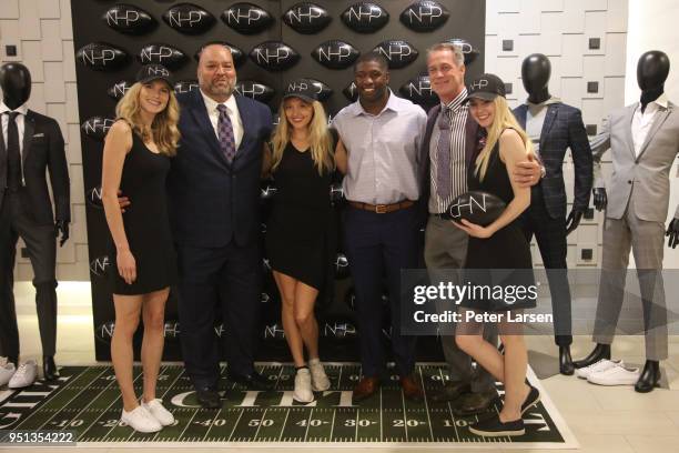 Rich Salgado, Roquan Smith, and Daryl Johnston with the NHP Girls attend the Fashion & Football Event at Saks Off 5TH> on April 25, 2018 in Grand...