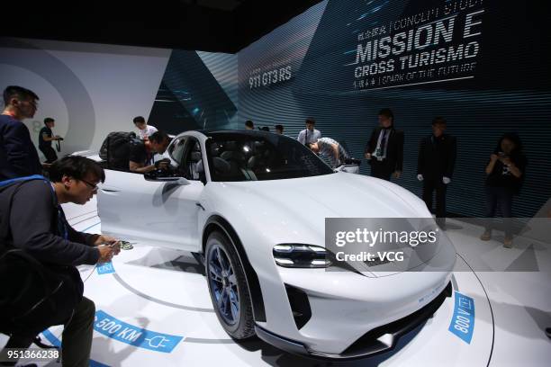 Porsche Mission E Cross Turismo car is on display during the Auto China 2018 at China International Exhibition Center on April 25, 2018 in Beijing,...