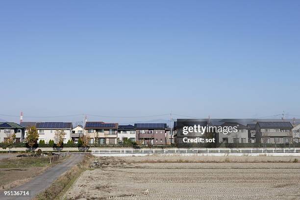 houses with solar panels on the roof - gunma prefecture stock pictures, royalty-free photos & images