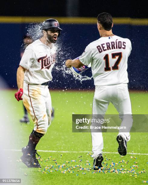 Ryan LaMarre of the Minnesota Twins celebrates his walk-off hit with Jose Berrios against the Cleveland Indians at Hiram Bithorn Stadium on Tuesday,...