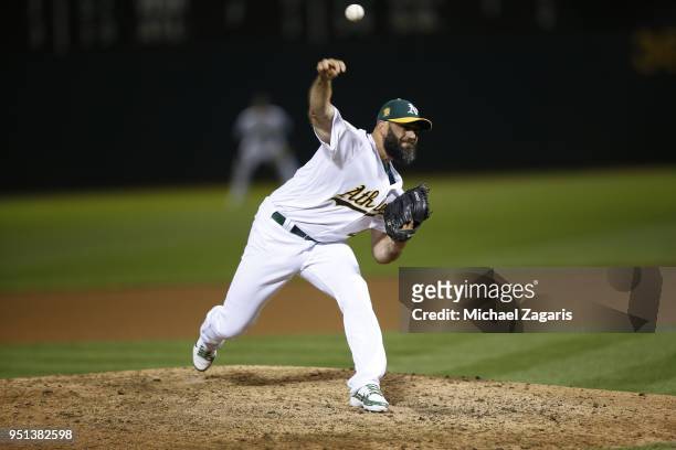 Chris Hatcher of the Oakland Athletics pitches during the game against the Texas Rangers at the Oakland Alameda Coliseum on April 2, 2018 in Oakland,...