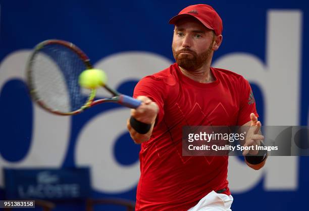Bjorn Fratangelo of the United States plays a forehand against Pablo Andujar of Spain in their match during day three of the ATP Barcelona Open Banc...