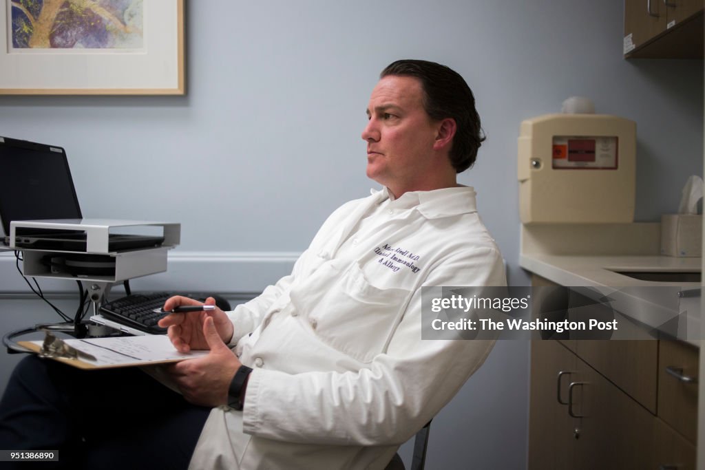SAN DIEGO, CA - FEBRUARY 20, 2018: Marc Riedl, MD, MS, talks wi