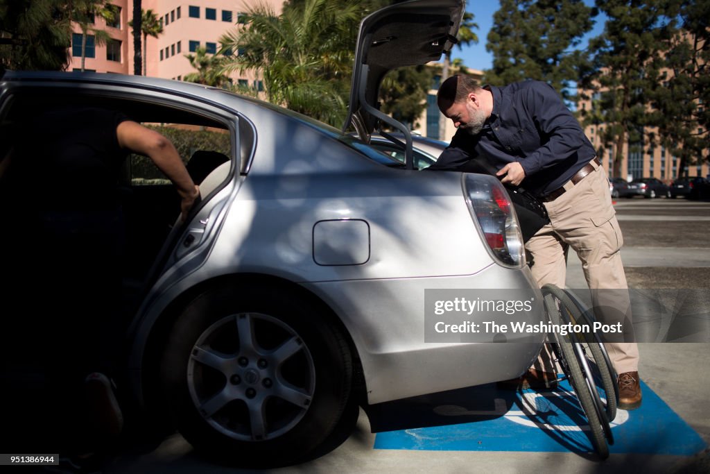 SAN DIEGO, CA - FEBRUARY 20, 2018: Ryan McCoy puts away his wif