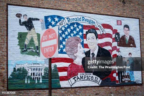 Mural of 40th President of the United States Ronald Reagan and First Lady Nancy Reagan is across the street from the Ronald Reagan Birthplace and...