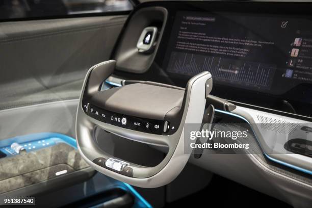 Steering wheel sits inside a BAIC Motor Corp. Senova concept vehicle on display at the Beijing International Automotive Exhibition in Beijing, China,...