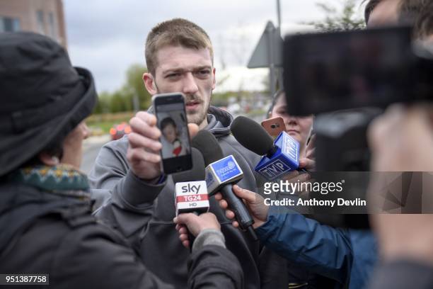 Tom Evans, Father of Alfie Evans, holds a photograph of his son as he speaks to media outside Alder Hey Children's Hospital on April 26, 2018 in...