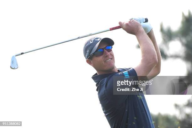 Nicolas Colsaerts of Belgium plays a shot during the first round of the 2018 Volvo China Open at Topwin Golf and Country Club on April 26, 2018 in...