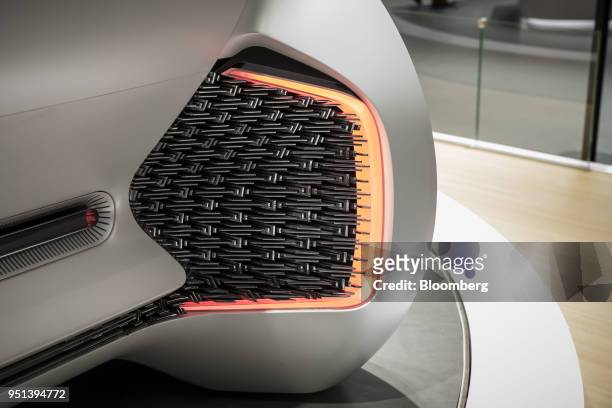 Rear brake light sits on a Chongqing Changan Automobile Co. Oshan Nu Age concept vehicle as it stands on display at the Beijing International...