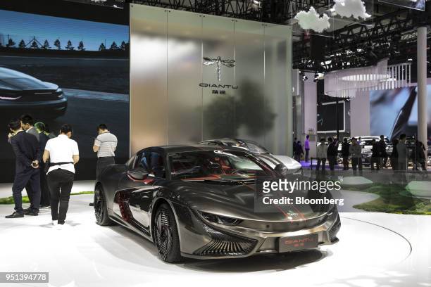 Auto Technology Co. Qiantu Motor K50 electric sports car stands on display at the Beijing International Automotive Exhibition in Beijing, China, on...