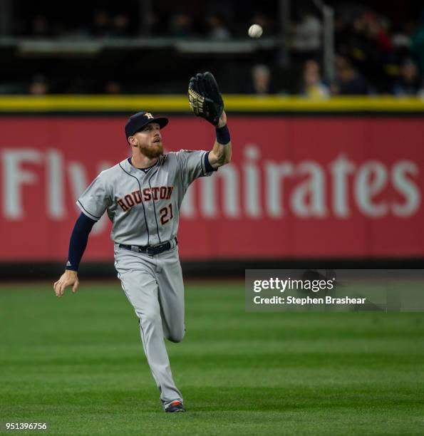 Leftfielder Derek Fisher of the Houston Astros fields a fly ball during a game against the Seattle Mariners at Safeco Field on April 18, 2018 in...