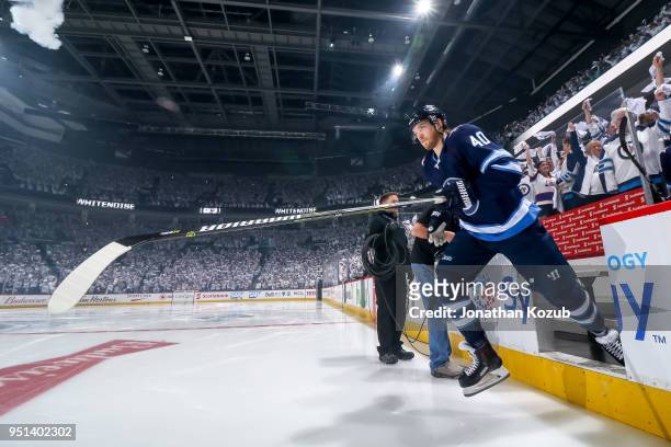 Joel Armia of the Winnipeg Jets hits the ice prior to NHL action against the Minnesota Wild in Game Five of the Western Conference First Round during...