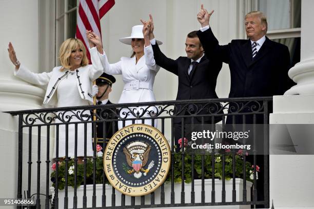 President Donald Trump, from right, Emmanuel Macron, France's president, U.S. First Lady Melania Trump, and Brigitte Macron, France's first lady,...