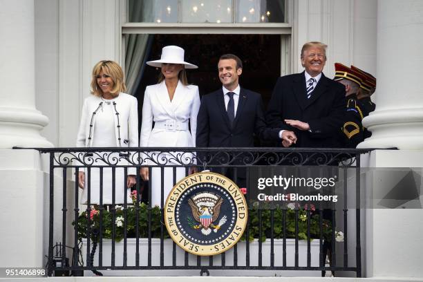 President Donald Trump, from right, Emmanuel Macron, France's president, U.S. First Lady Melania Trump, and Brigitte Macron, France's first lady,...