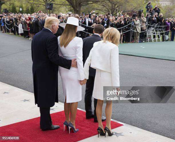 President Donald Trump, from left, U.S. First Lady Melania Trump, Emmanuel Macron, France's president, and Brigitte Macron, France's first lady,...