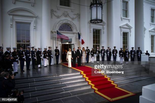 First Lady Melania Trump, from right, U.S. President Donald Trump, Emmanuel Macron, France's president, and Brigitte Macron, France's first lady,...