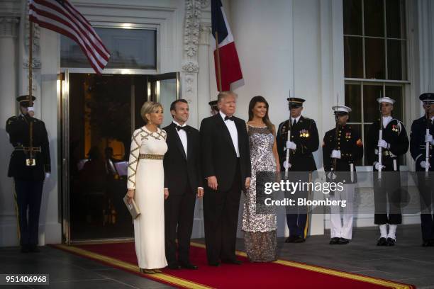 First Lady Melania Trump, from right, U.S. President Donald Trump, Emmanuel Macron, France's president, and Brigitte Macron, France's first lady,...