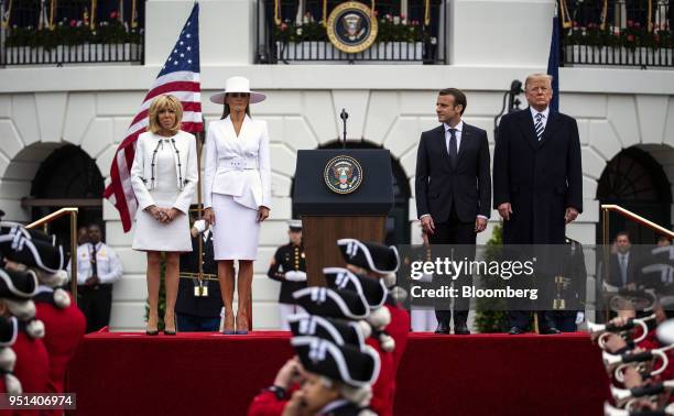 President Donald Trump, from right, Emmanuel Macron, France's president, U.S. First Lady Melania Trump, and Brigitte Macron, France's first lady,...