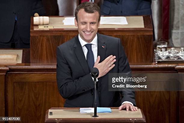 Emmanuel Macron, France's president, center, gestures while arriving to a joint meeting of Congress at the U.S. Capitol in Washington, D.C., U.S., on...