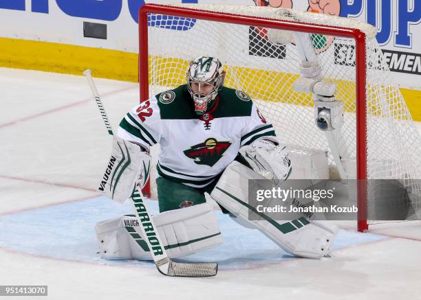 Goaltender Alex Stalock of the Minnesota Wild guards the net during second period action against the Winnipeg Jets in Game Five of the Western...