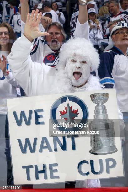 Winnipeg Jets fan shows off his wishes as he cheers on the team following a 5-0 victory over the Minnesota Wild in Game Five of the Western...